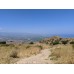 Ancient path on Acrocorinth with coastal views